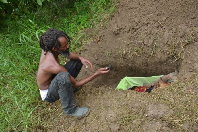 Jamaican man holds funeral for his dog Jamaican man holds funeral for his dog