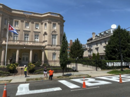 The message "Cuba Libre" or 'free Cuba', is seen painted in giant block lettering on the street directly in front of the Cuban embassy in this frame grab from video shot in Washington, U.S.