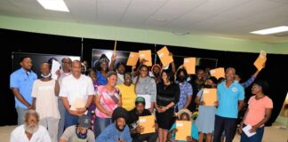 Residents of The La Guerite North Housing Development were presented with their Certificate of Title (COT) at a simple but significant ceremony held at the National Emergency Management (NEMA) Conference Room. The ceremony took place on Wednesday, July 27, 2022, thus officially advancing their desire to become land owners.