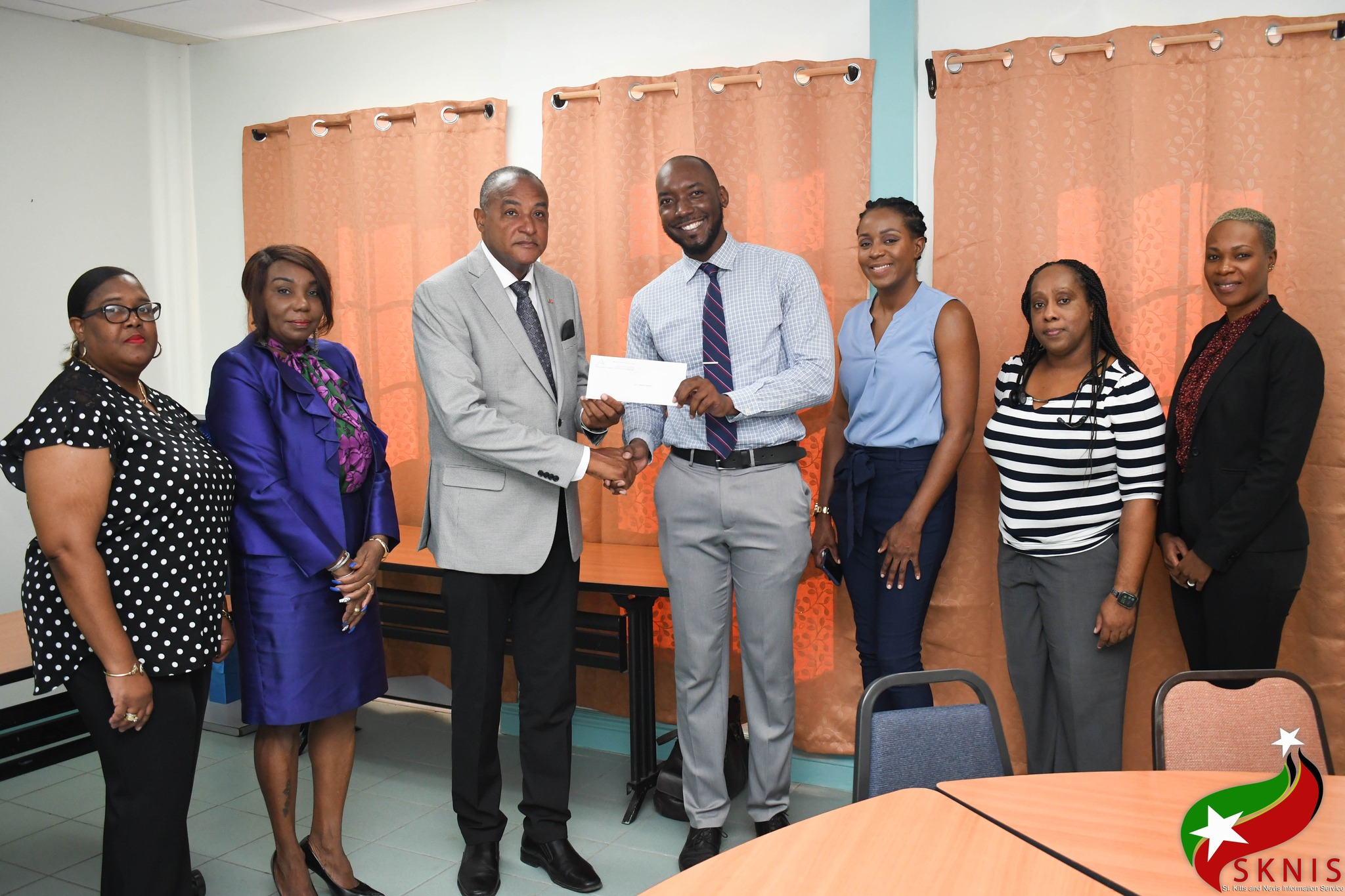 Terrance Drew thanks Swiss Government for financial assistant at JNF Hospital, Image Courtesy: Facebook, SKNIS