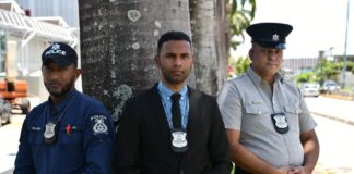 Community applauds Police Officers for s, aving family during floodsCourtesy PC Karl Baptiste, Corporate Communications Unit, Audio Visual