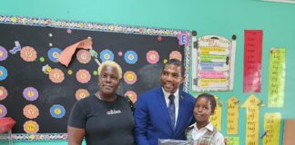 PM Drew and Minister Geoffrey Hanley fulfil promise Of donating laptops,image: facebook