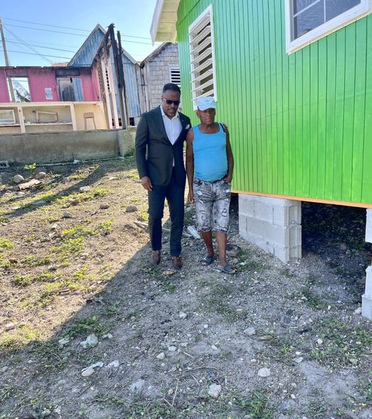 Premier Brantley visited fire victim on receiving a new house,image :facebook Premier Brantley visited fire victim on receiving a new house,image :facebook