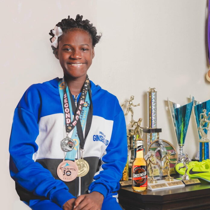 Minister Douglas congratulates De’Cheynelle Thomas on qualifying for CARIFTA 2024 De’Cheynelle Thomas