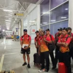 Sports Minister Duggins greets players of Papua New Guinea team. (Credits: Samal Duggins, Facebook)