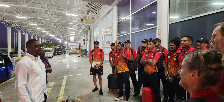 Sports Minister Duggins greets players of Papua New Guinea team. (Credits: Samal Duggins, Facebook)