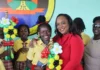 Marsha Henderson presents tokens of appreciation to celebrate achievement of children in Netball League. Credits: Facebook, Marsha Henderson.