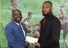 Samal Duggins with Cricketer Mikyle Louis.