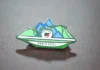 Artist Dennis Richards creates Olympic pin for athletes from St Kitts and Nevis. Credits: SKNOC.