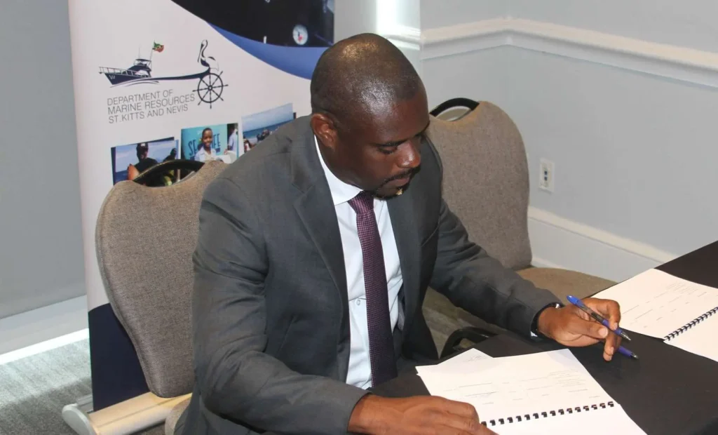 Minister Samal Duggins signing the MoU. Credits: Facebook.