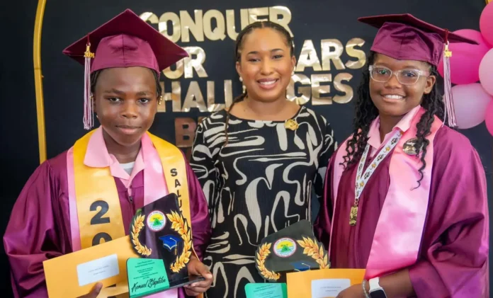 PM Drew congratulated the Cayon Primary School on their graduation. Credits: Facebook.