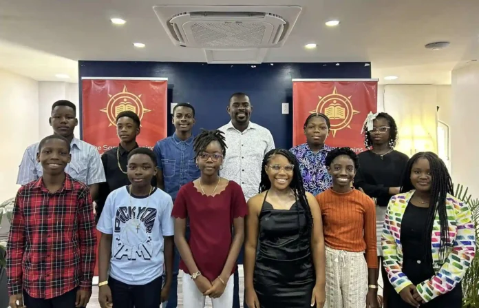 Minister Duggins celebrated 20 years of ‘Finding Your Passion Scholarship’ Programme. Credits: Facebook.