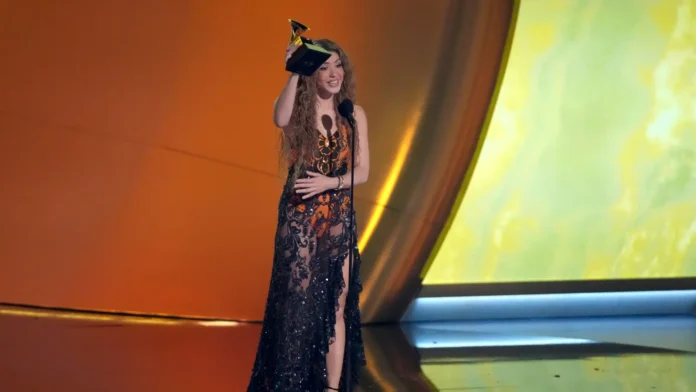 Shakira turns heads with stunning Etro dress at the Grammys after 18 years