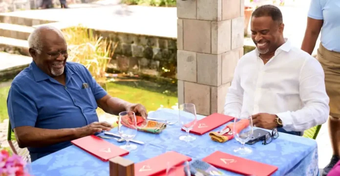 Premier Mark Brantley meets Dr Julius Garvey during his visit to Nevis