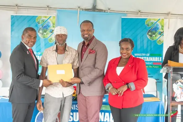565332461_1250053537161540_7018895295378897599_n The Prime Minister of St Kitts and Nevis received the land titles and ownership rights for the lands that they have occupied for years.