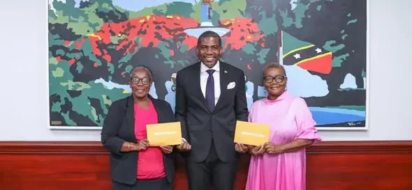 PM Terrance Drew gives EC$15,000 cheques to Breast Cancer Support Groups