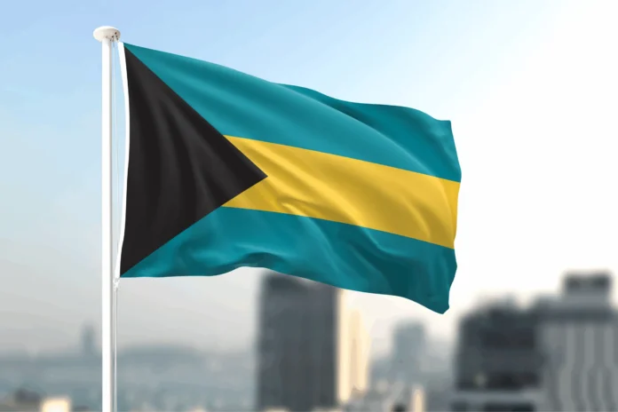 Bahamas_Flag_mockup_city-background-1-scaled